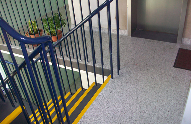 What are the benefits of refurbishing social housing developments with resin floors?2